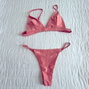 Brand new never worn SF bathing suit.Top and bottom. Plus super cheeky